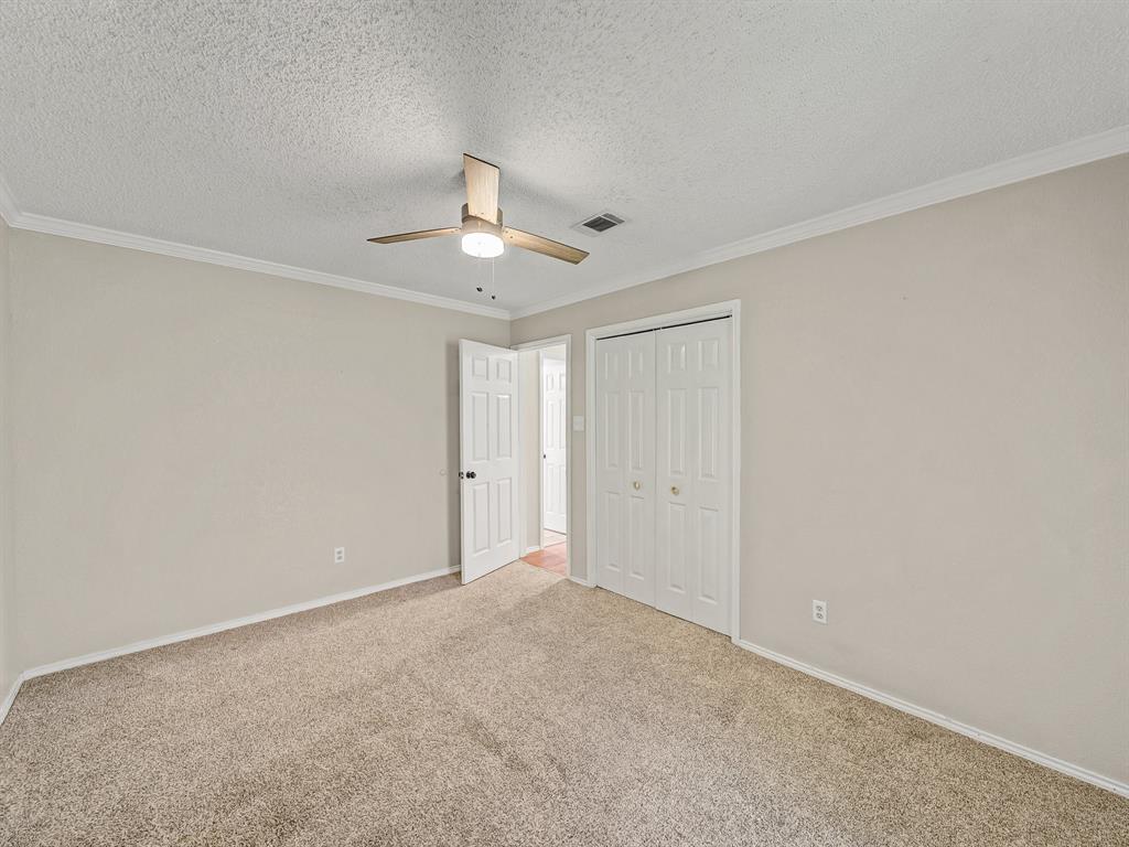 121 Northeast Brushy Mound Road Burleson, TX 76028 - Photo 21 of 35 a view of an empty room with a window