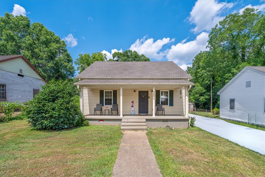 1102 West End Avenue Anderson, SC 29625 - Photo 1 of 28 A welcoming front porch invites relaxation at this charming residence.