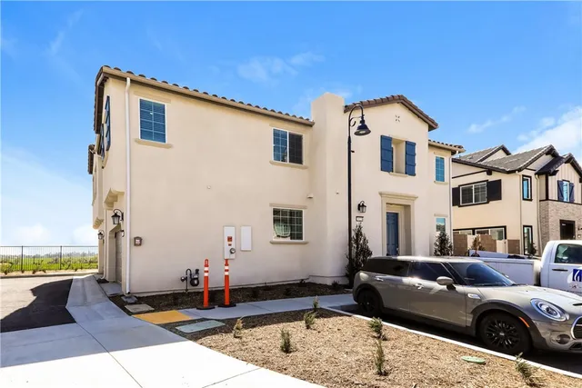 a front view of a house with a couch