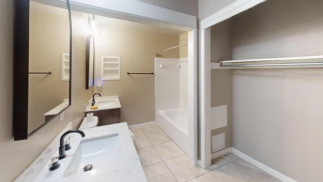 a bathroom with a sink and a tub
