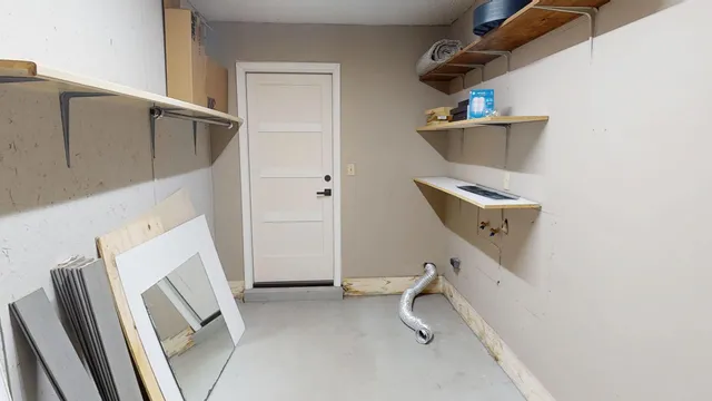 a view of storage and utility room