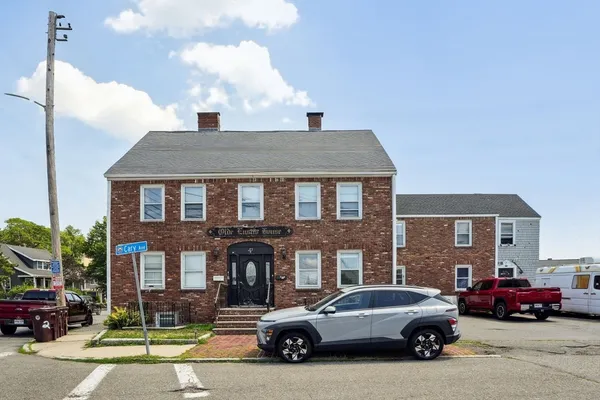 a car parked in front of a house