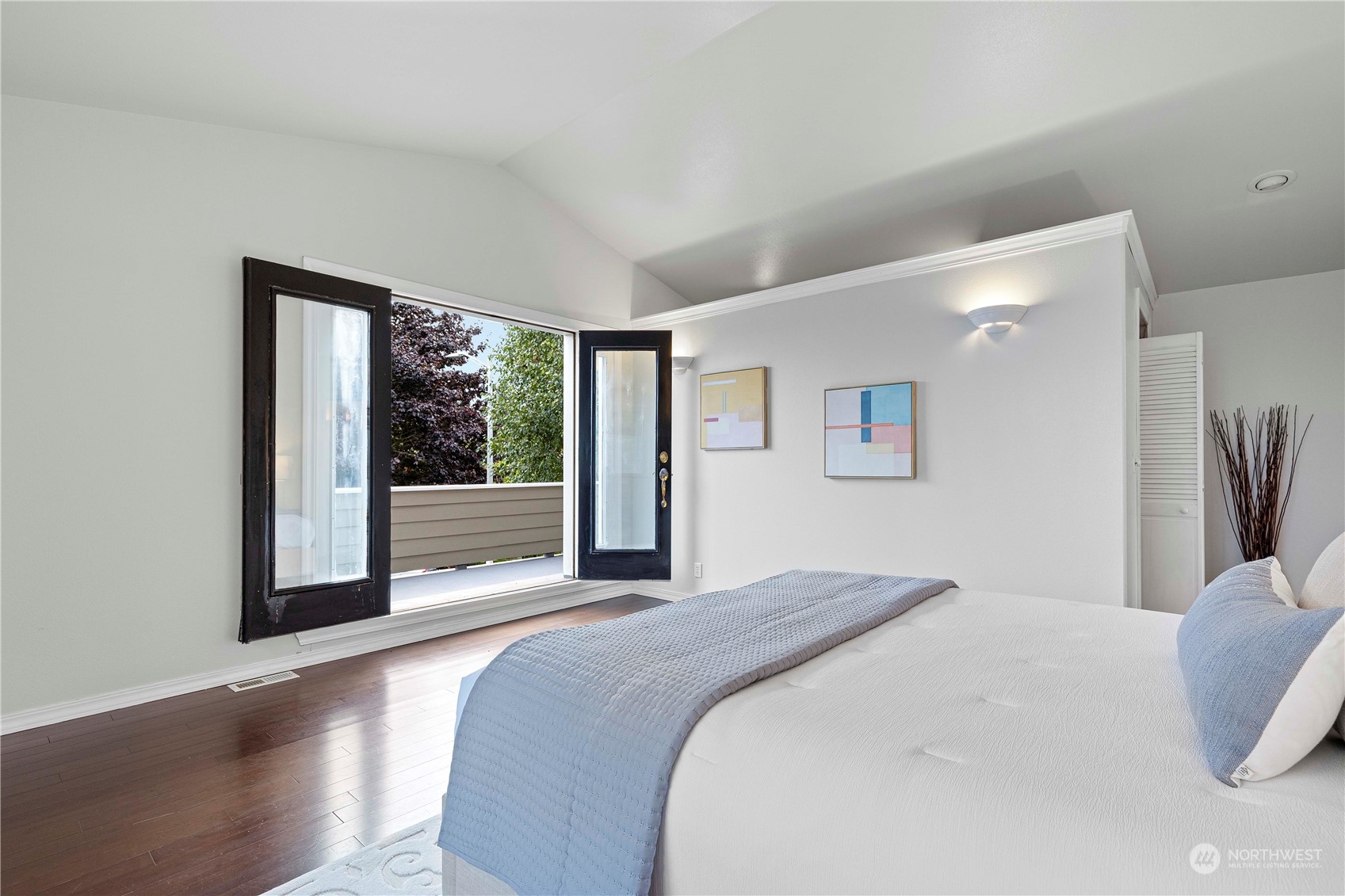 400 Park Place Everett, WA 98203 - Photo 27 of 40 a bedroom with a large bed and a large window