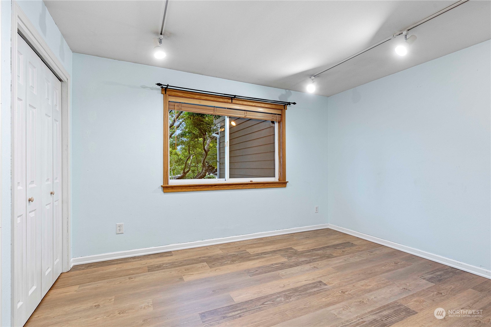 400 Park Place Everett, WA 98203 - Photo 35 of 40 an empty room with wooden floor and windows