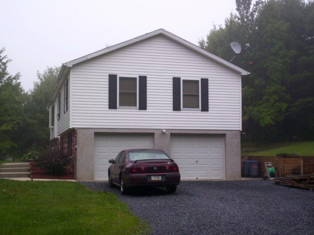 67 Comanche Pines Road Effort, PA 18330 - Photo 3 of 4 a car parked in front of a house