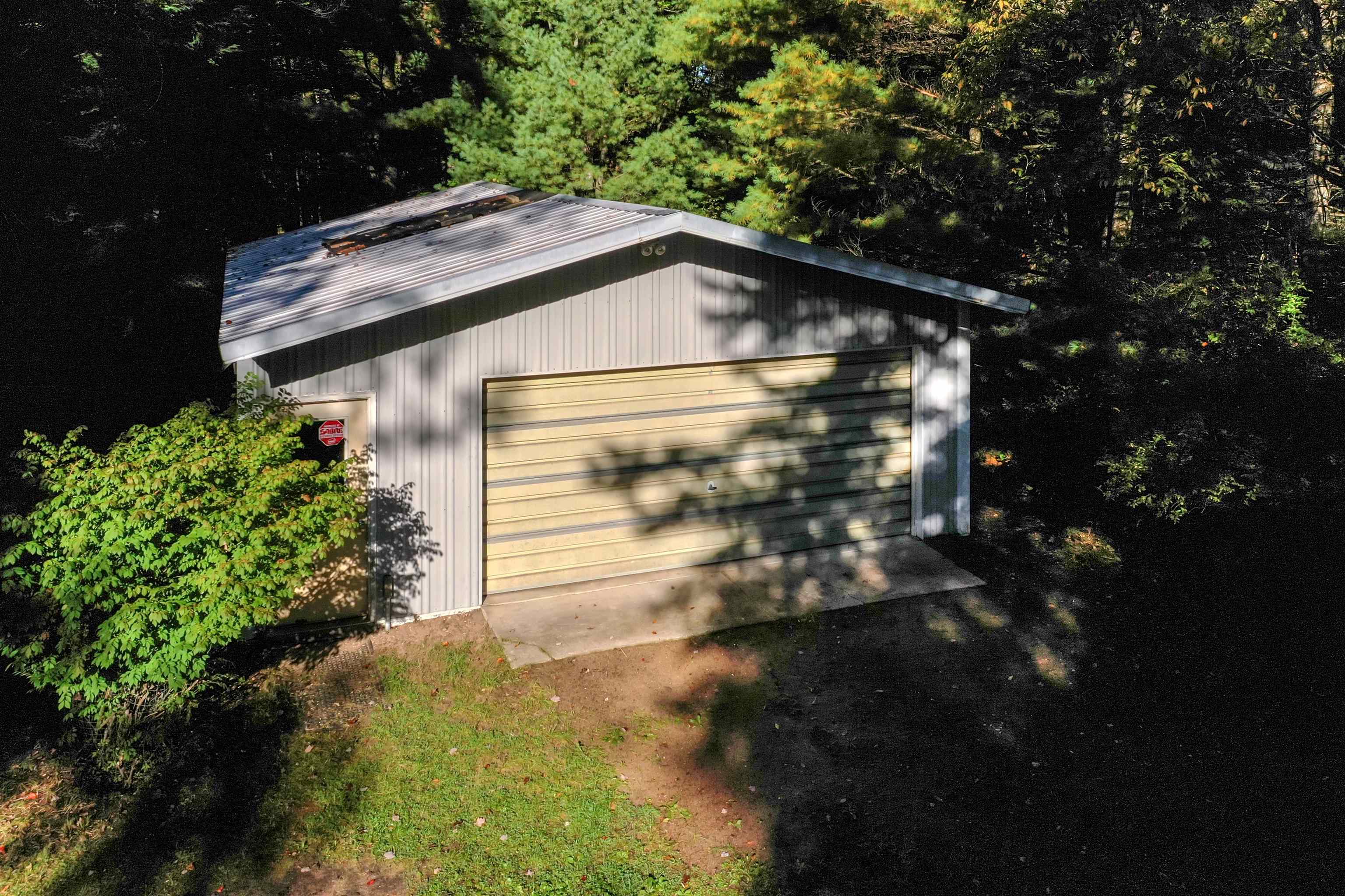 3876 South Lachance Rd Lake Lake City, MI 49651 - Photo 6 of 33