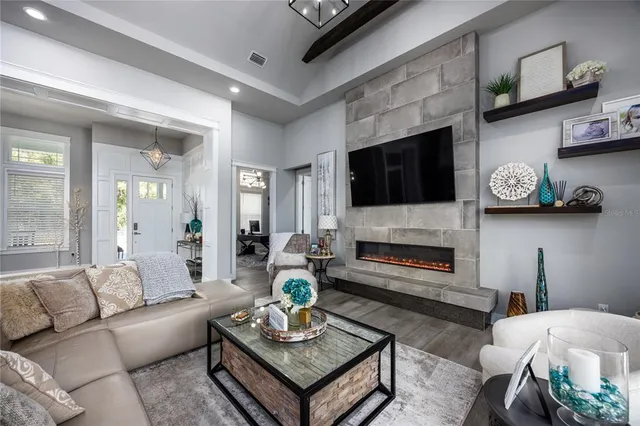 a large kitchen with a table and chairs