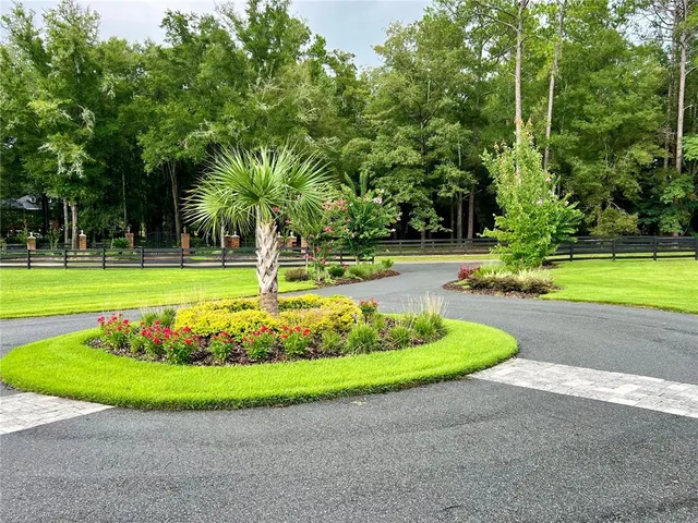 a view of a golf course with swimming pool