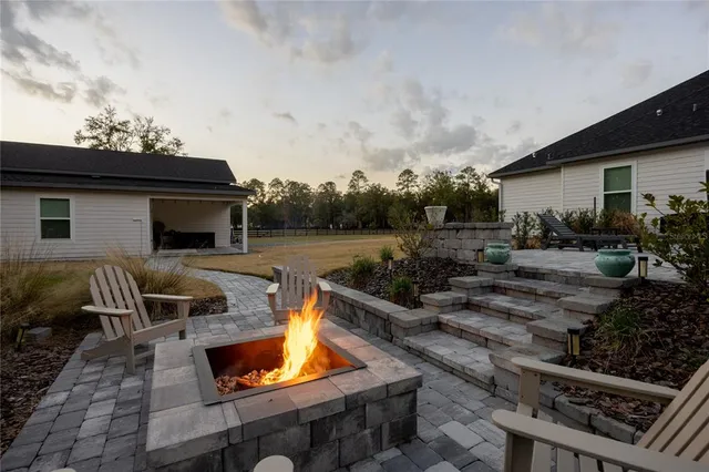 a front view of a house with a yard and a garage