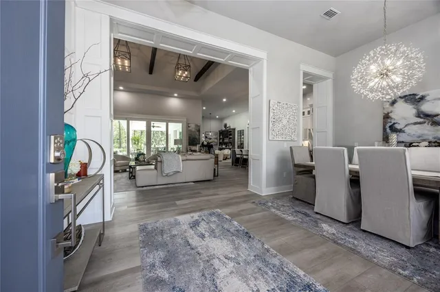 a room with a table and gym equipment