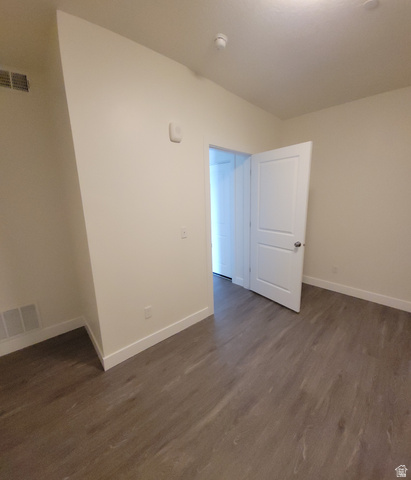 2101 North Main Street, Unit 309 Sunset, UT 84015 - Photo 10 of 17 Unfurnished room featuring dark wood-style flooring