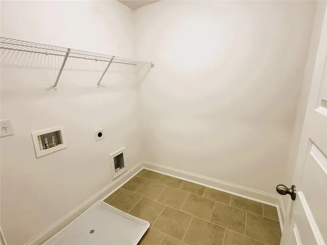 a view of a room with rack on the wall