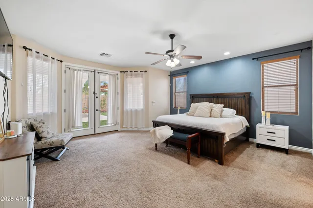 a kitchen that has a sink and a stove top oven