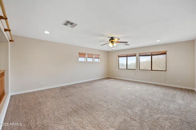 a spacious bathroom with a bathtub and a shower