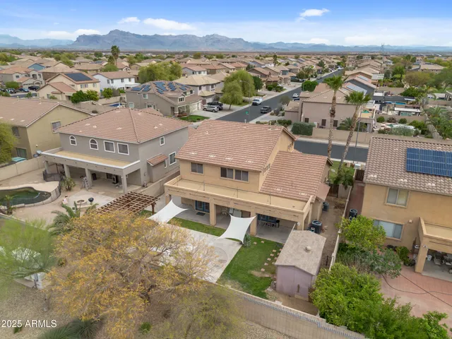 an aerial view of a house with a garden