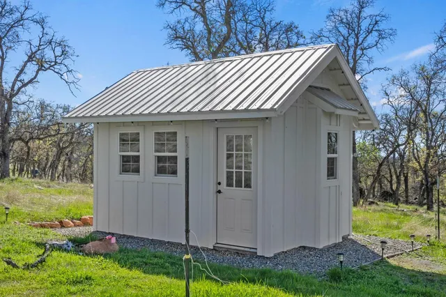 a front view of house with yard