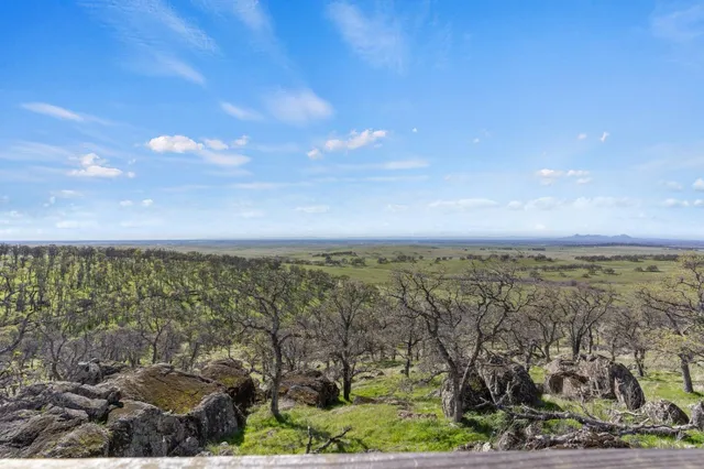 swimming pool view with a seating space