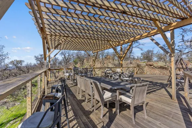 a view of a patio with wooden floor