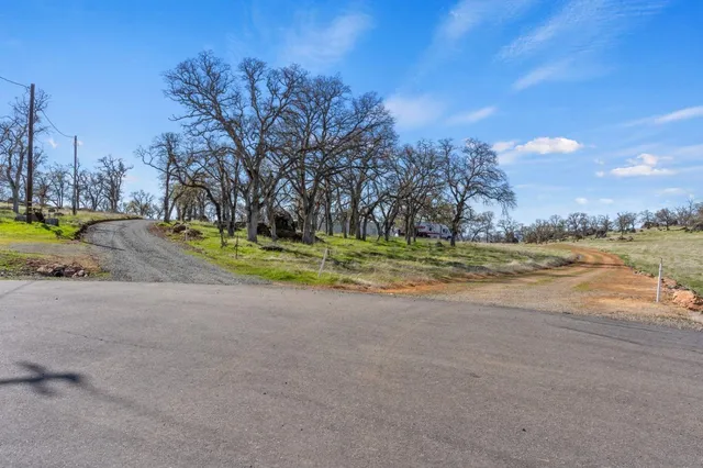 a view of a ocean with a building in the background