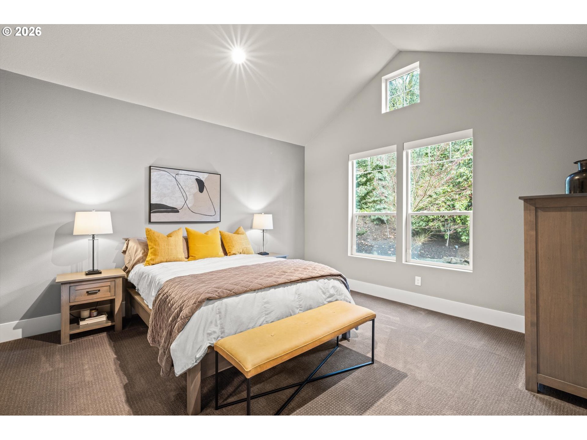 2193 Northeast 3rd Avenue Camas, WA 98607 - Photo 22 of 32 a bedroom with a bed a window and a lamp