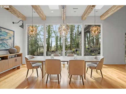a dining room with furniture and window