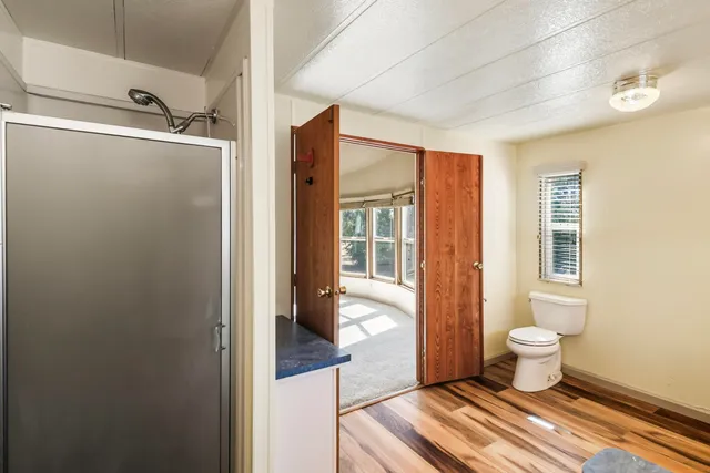 a bathroom with a toilet and a sink