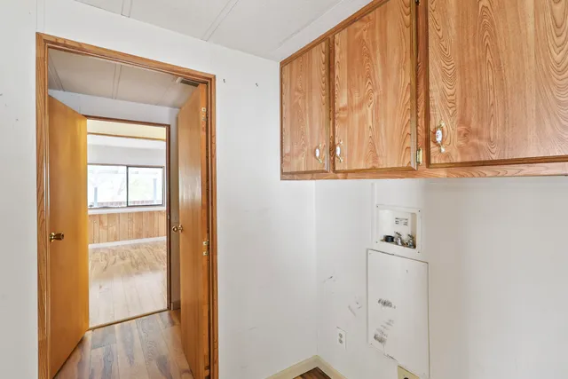 a view of a balcony with wooden floor