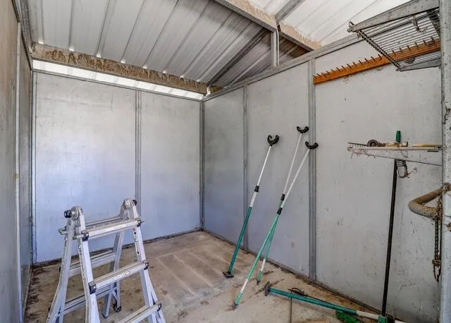 a kitchen with sink cabinets and outdoor view