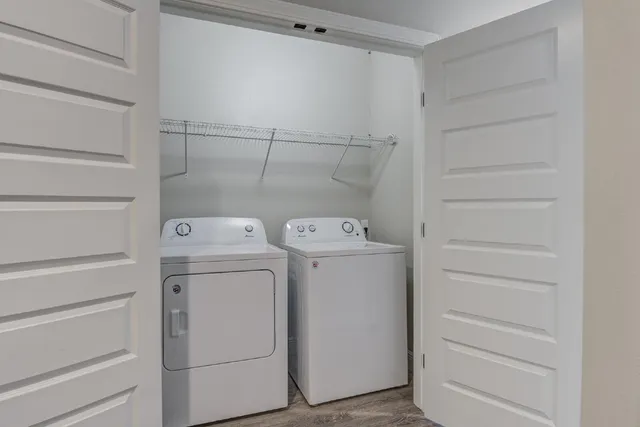 a utility room with dryer and washer