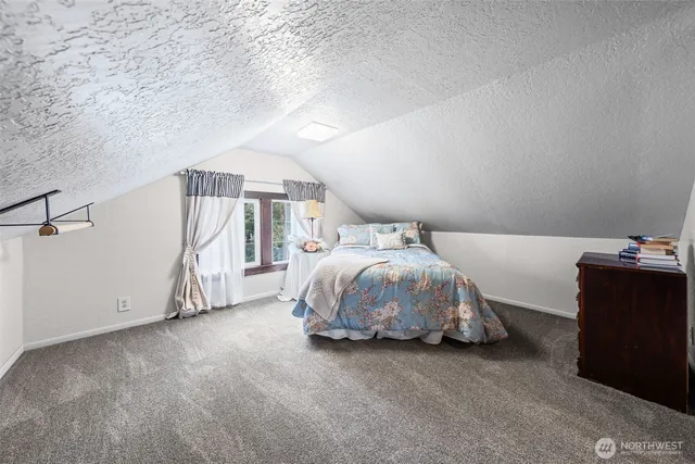 an aerial view of a house with a garden