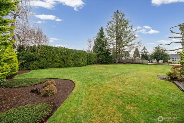 a view of a garden with basketball court