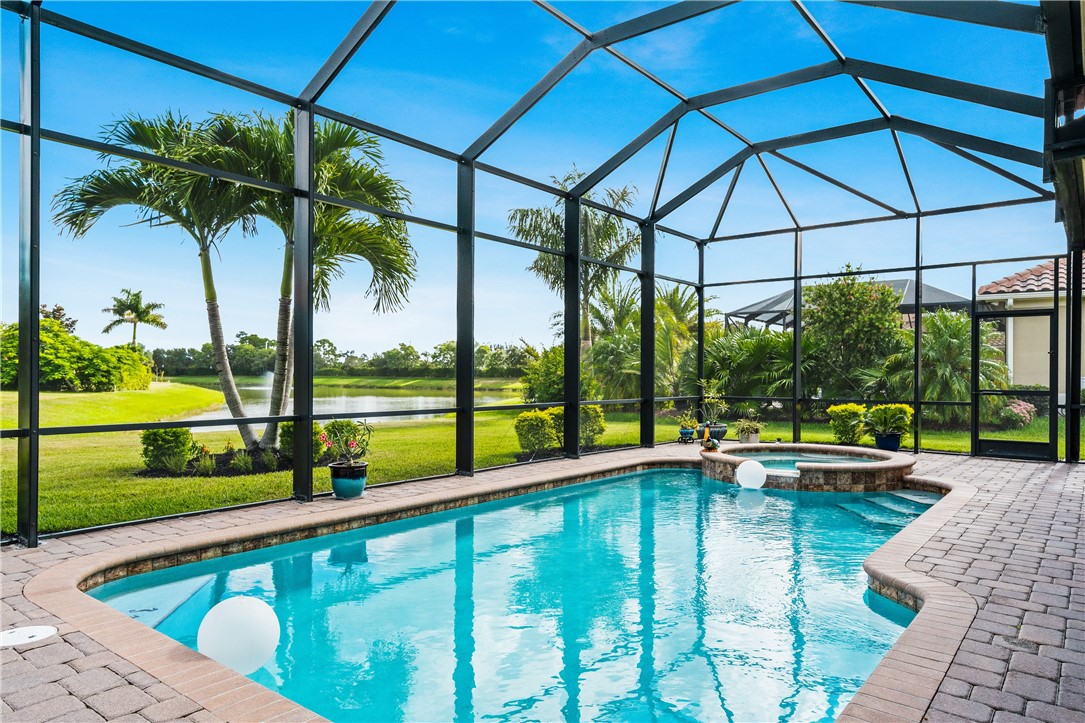 8250 Halbert Lane Vero Beach, FL 32968 - Photo 30 of 36 a view of swimming pool with a patio
