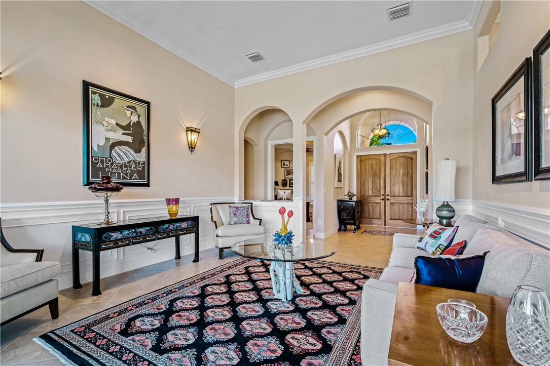 8250 Halbert Lane Vero Beach, FL 32968 - Photo 3 of 36 a living room with furniture and a window