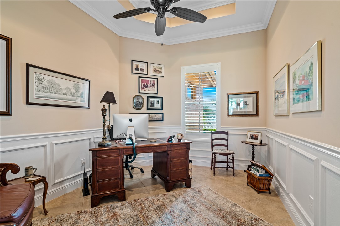 8250 Halbert Lane Vero Beach, FL 32968 - Photo 6 of 36 a view of a workspace with furniture and a window