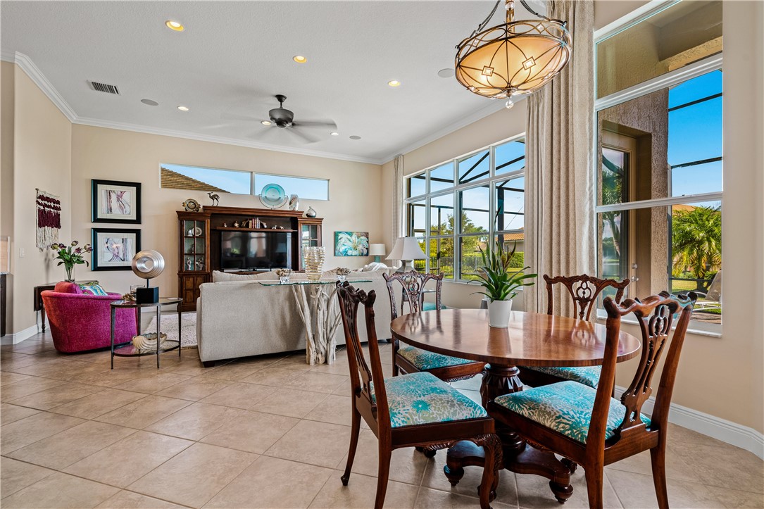 8250 Halbert Lane Vero Beach, FL 32968 - Photo 7 of 36 a view of a dining room with furniture window and outside view