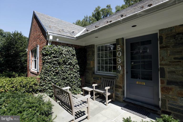 5039 Overlook Road Northwest Washington, DC 20016 - Photo 16 of 27 a balcony with table and chairs