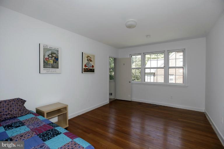5039 Overlook Road Northwest Washington, DC 20016 - Photo 20 of 27 a room with furniture and a window