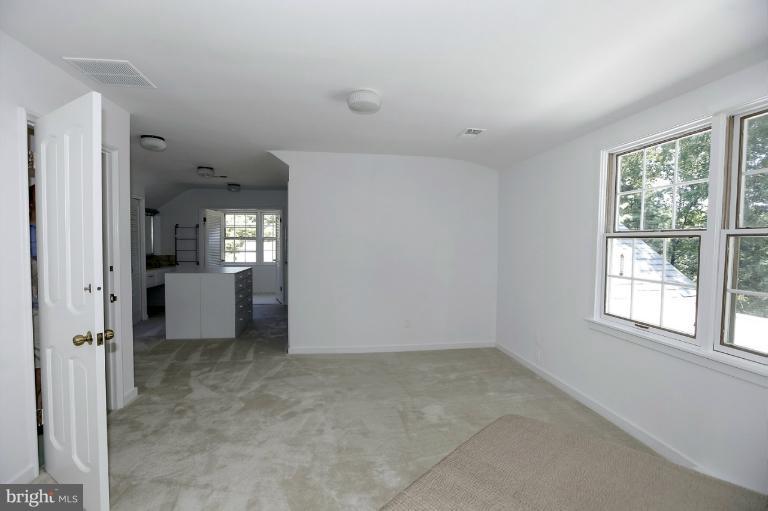 5039 Overlook Road Northwest Washington, DC 20016 - Photo 26 of 27 a view of a room with a windows and a kitchen