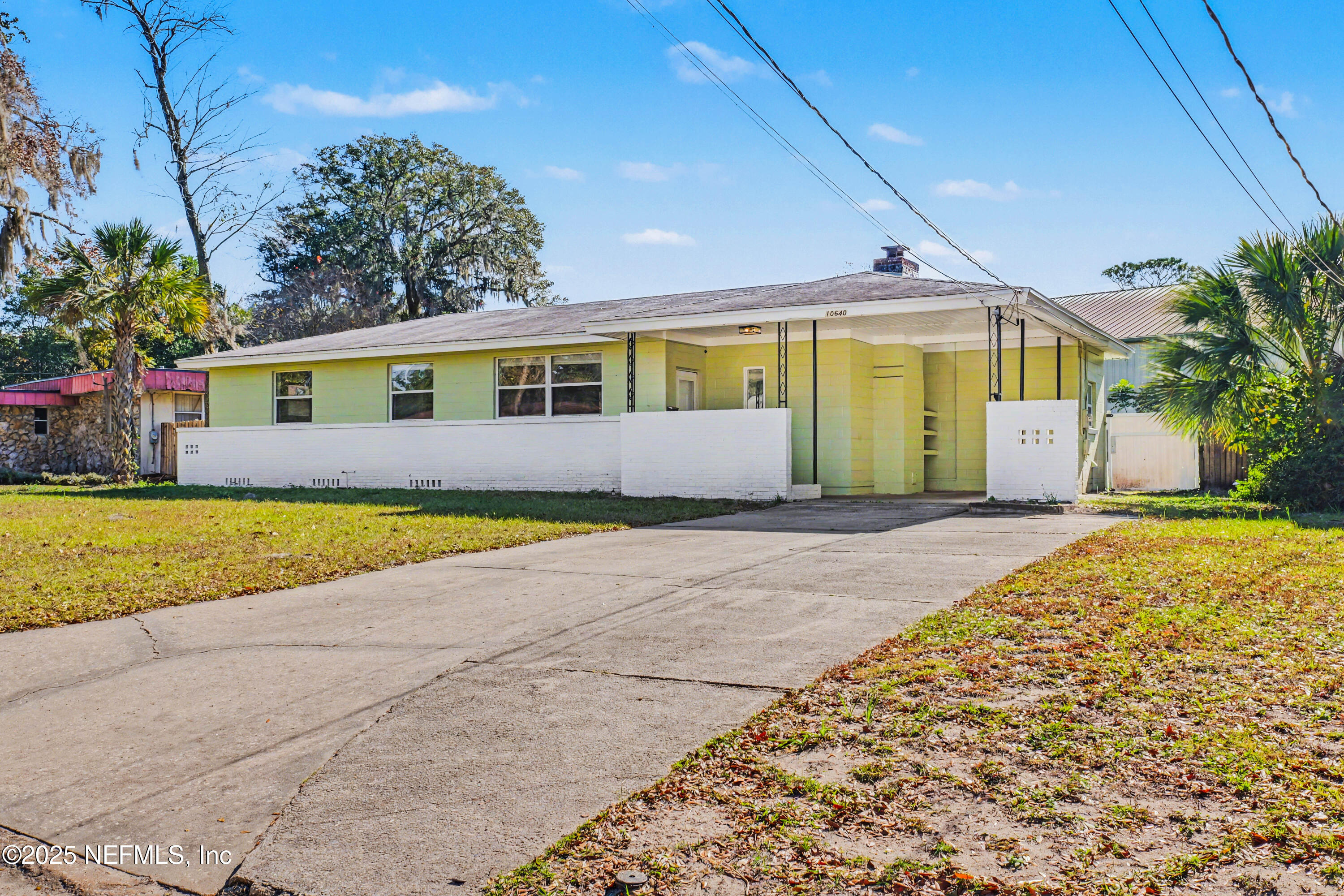 10640 Hemming Road Jacksonville, FL 32225 - Photo 1 of 46 a front view of house with yard