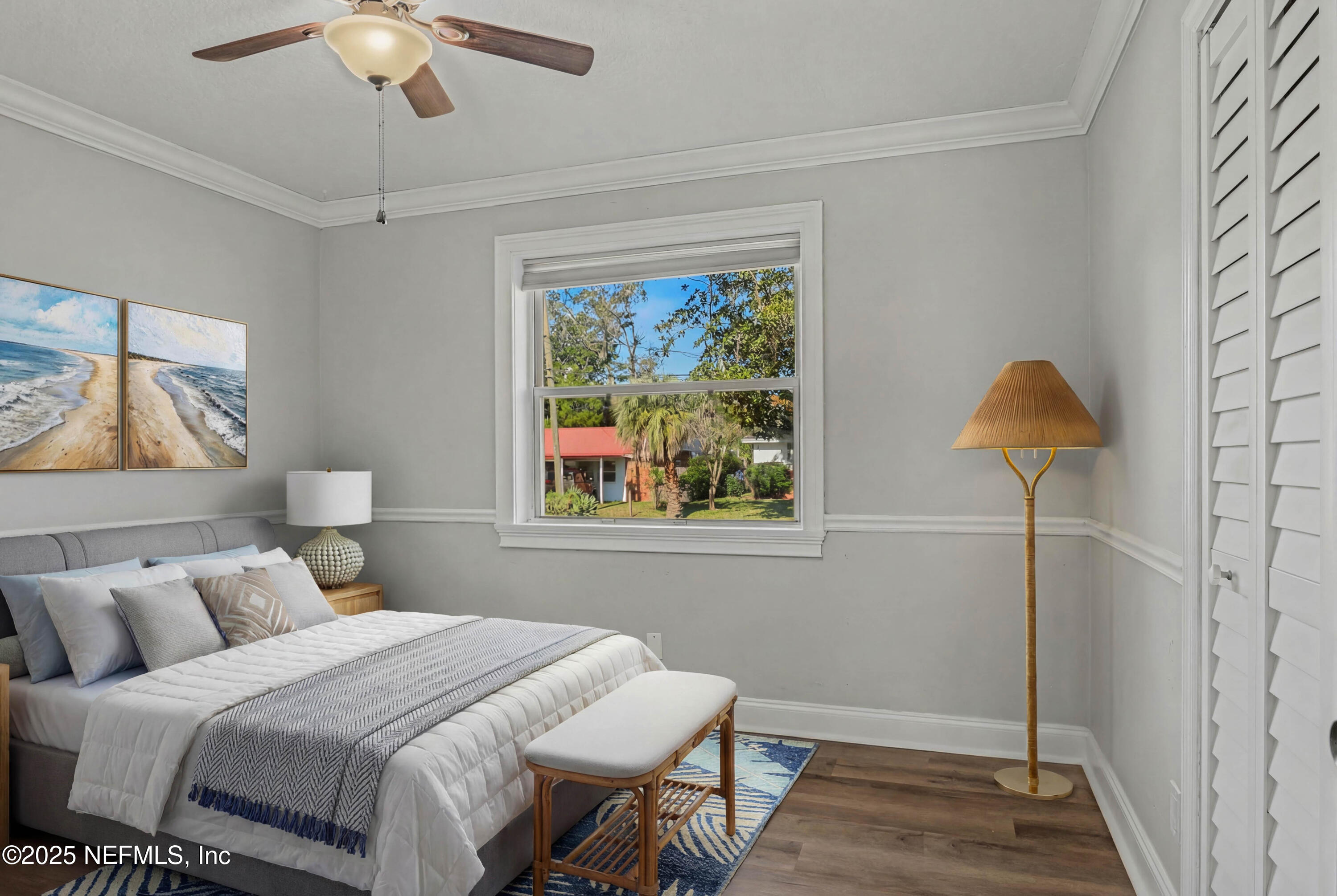 10640 Hemming Road Jacksonville, FL 32225 - Photo 20 of 46 a bedroom with a bed and lamps