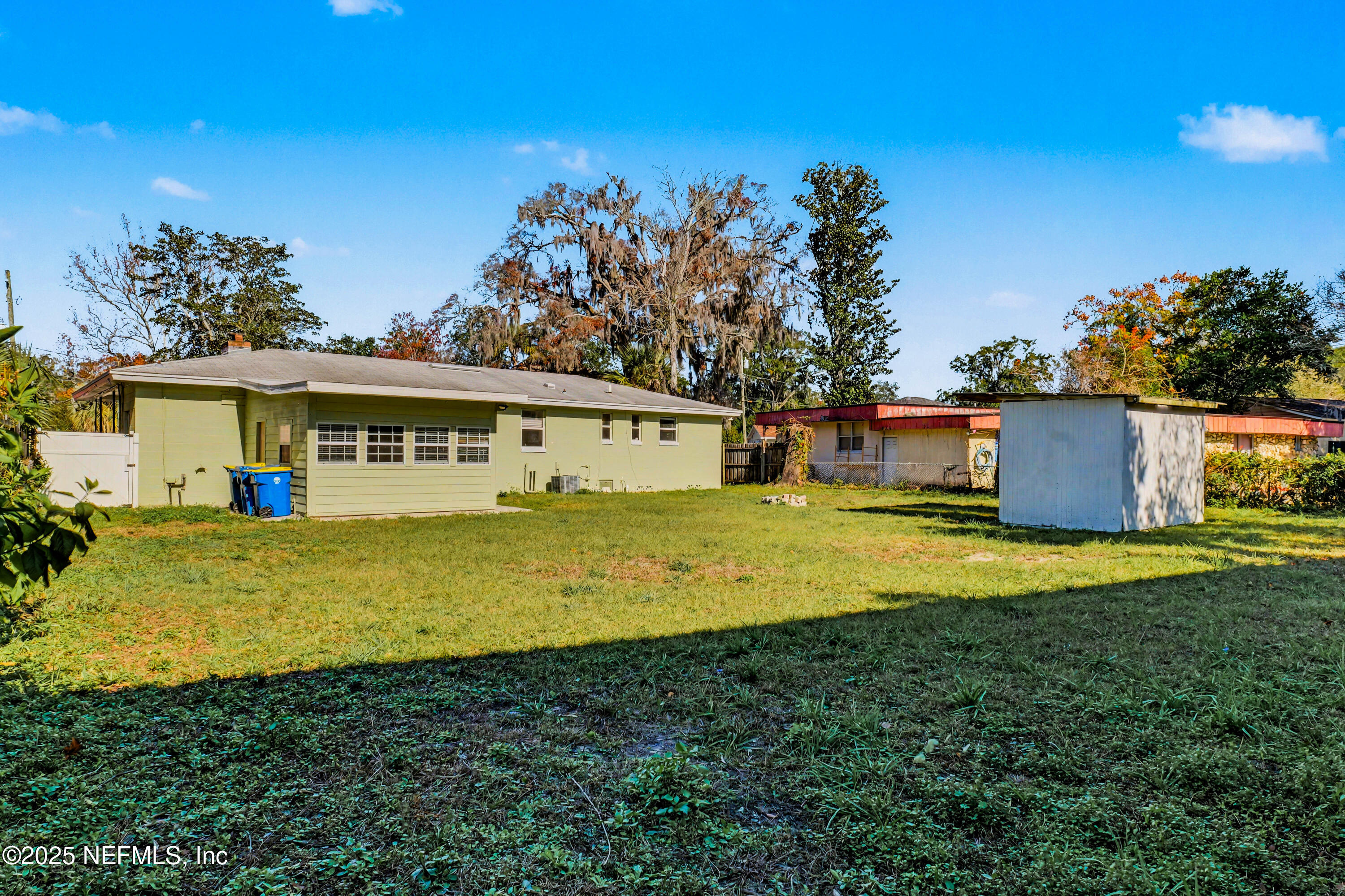 10640 Hemming Road Jacksonville, FL 32225 - Photo 24 of 46 a view of a house with backyard space and balcony