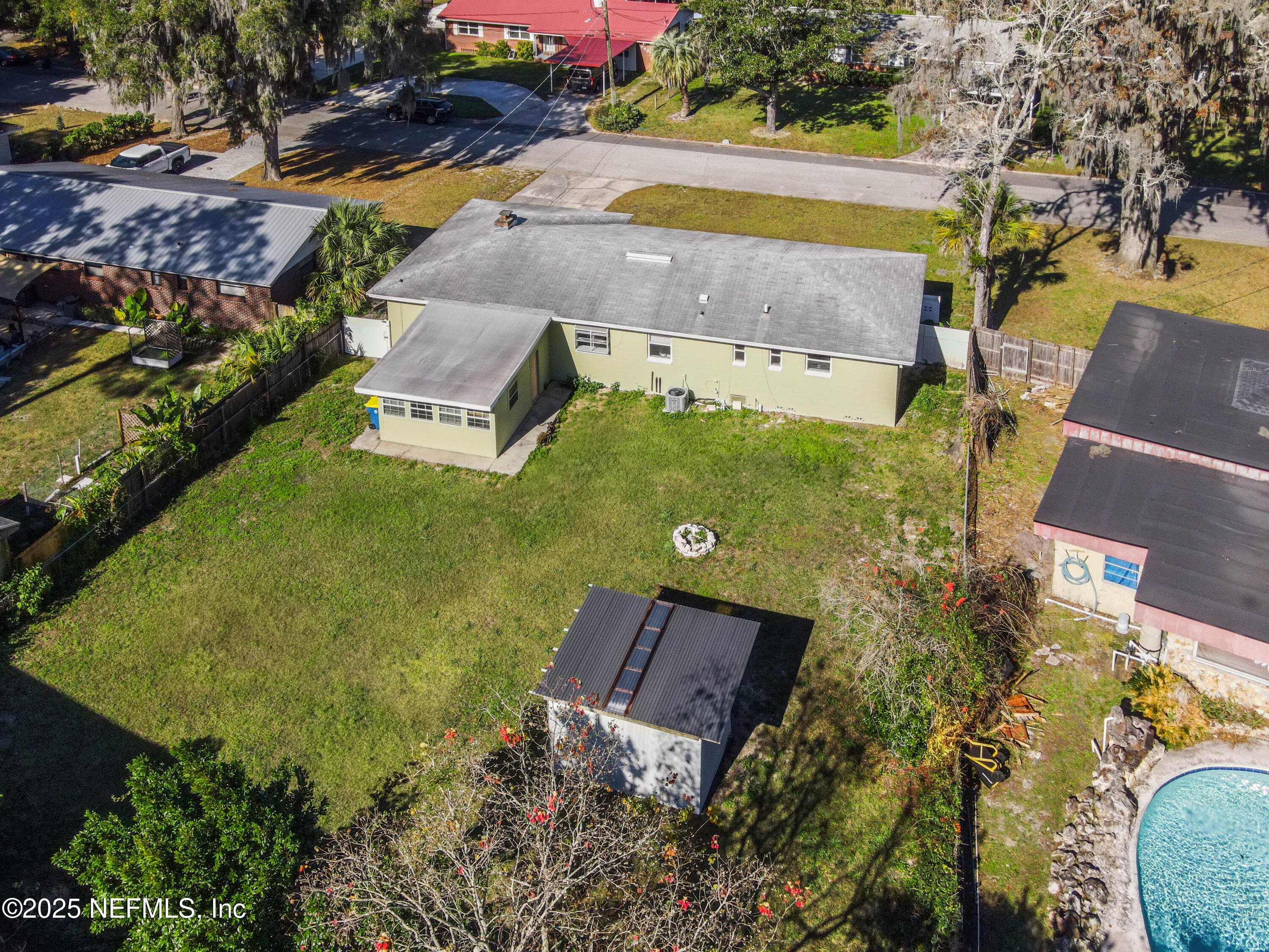 10640 Hemming Road Jacksonville, FL 32225 - Photo 28 of 46 an aerial view of a house with a yard basket ball court and outdoor seating