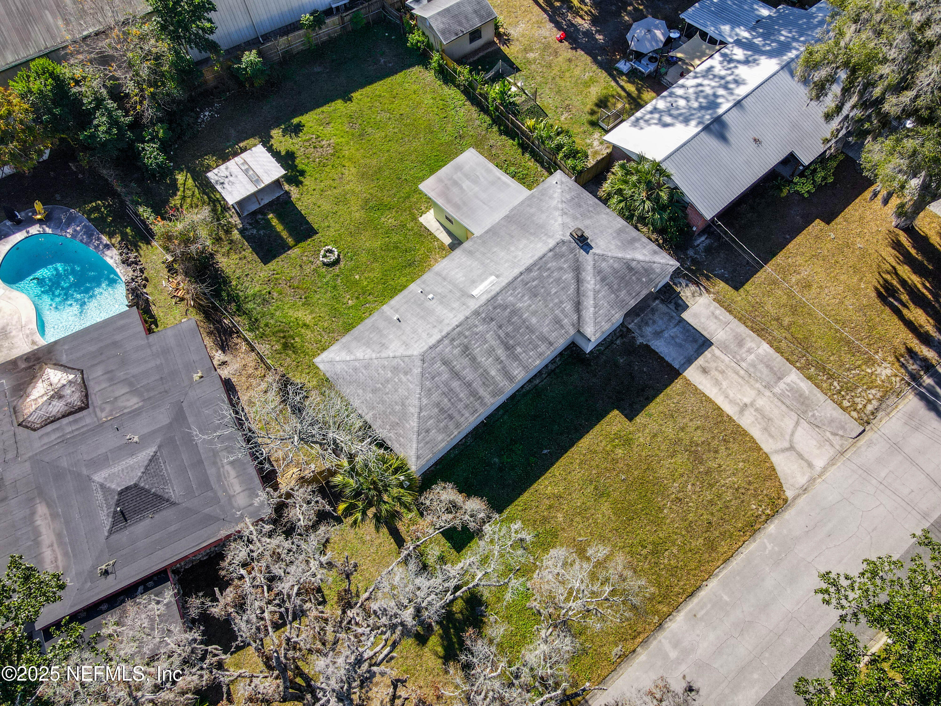 10640 Hemming Road Jacksonville, FL 32225 - Photo 30 of 46 an aerial view of a house with a yard