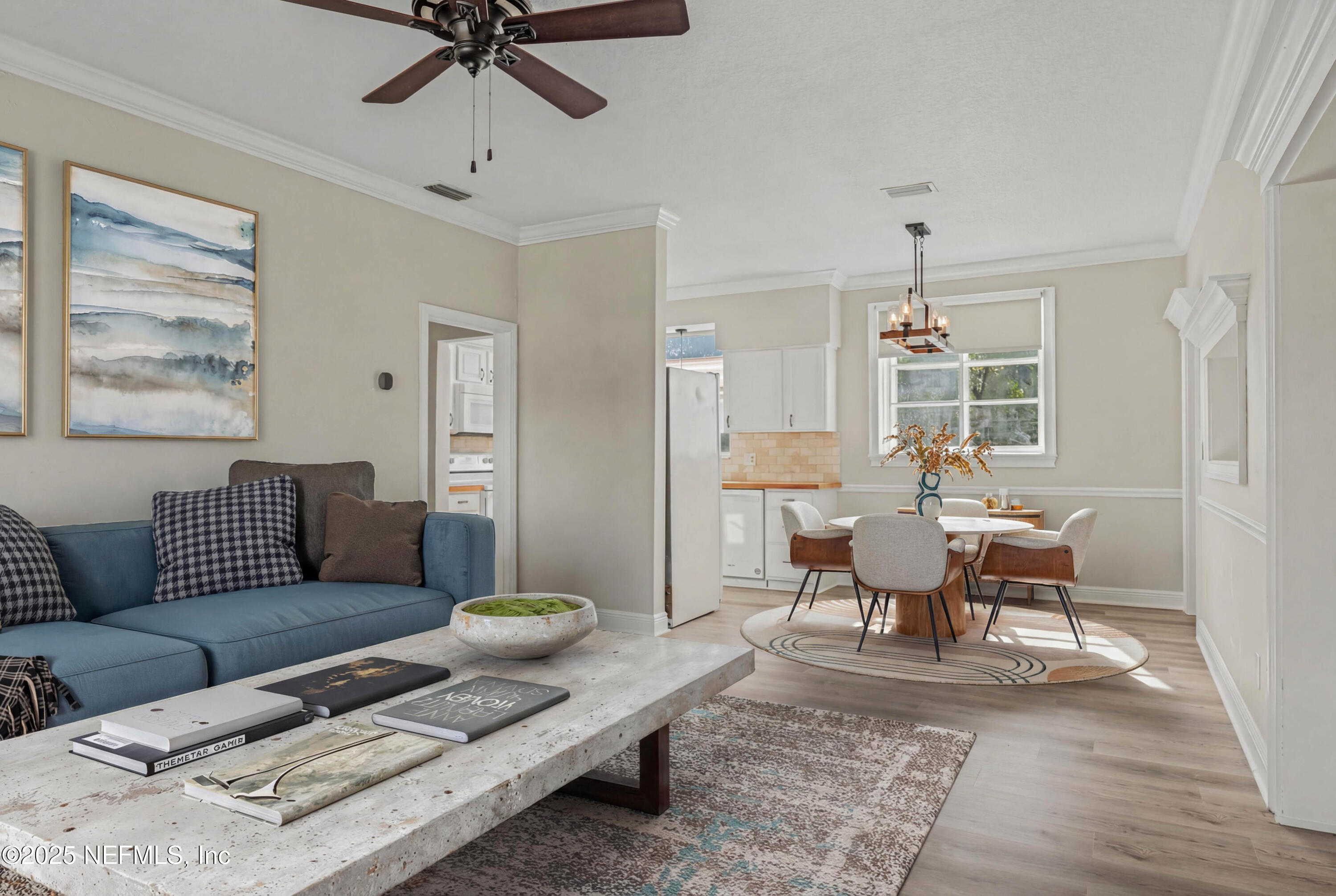 10640 Hemming Road Jacksonville, FL 32225 - Photo 3 of 46 a living room with furniture and a wooden floor