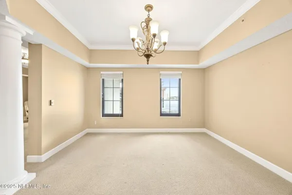 a view of a living room and livingroom furniture wooden floor and a window