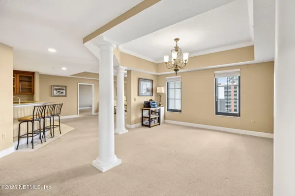 a view of a livingroom with furniture and a fireplace