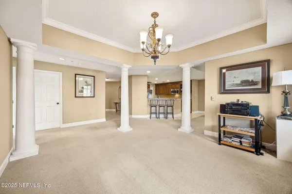 a view of a livingroom with furniture and a couch