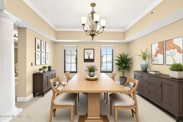 a living room with furniture and a table