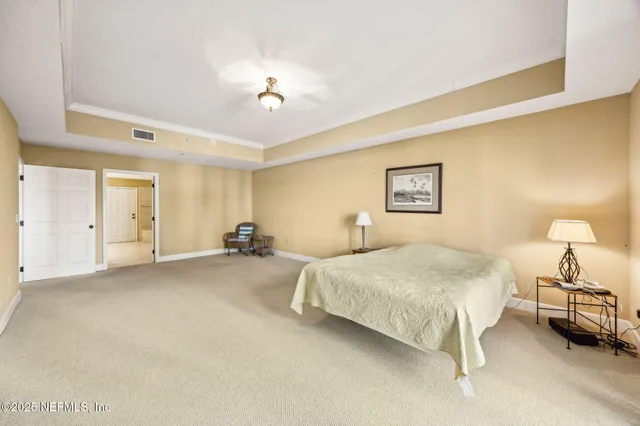 a view of a balcony with table and chairs