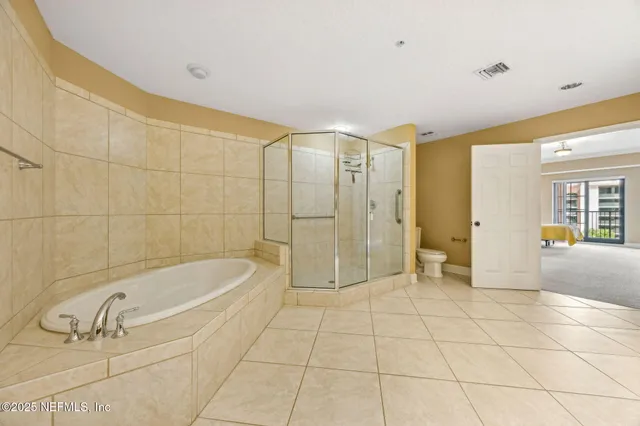 an aerial view of a house with outdoor space